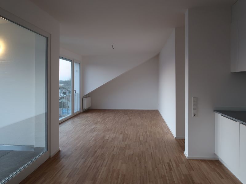 Küche und Wohnraum in der neuen Dachwohnung